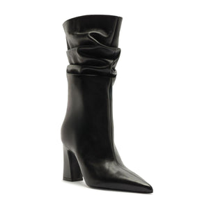 Three-quarter view of the Harriet Leather Boot in black showcasing its ruched shaft, pointed toe, and block heel on a white background