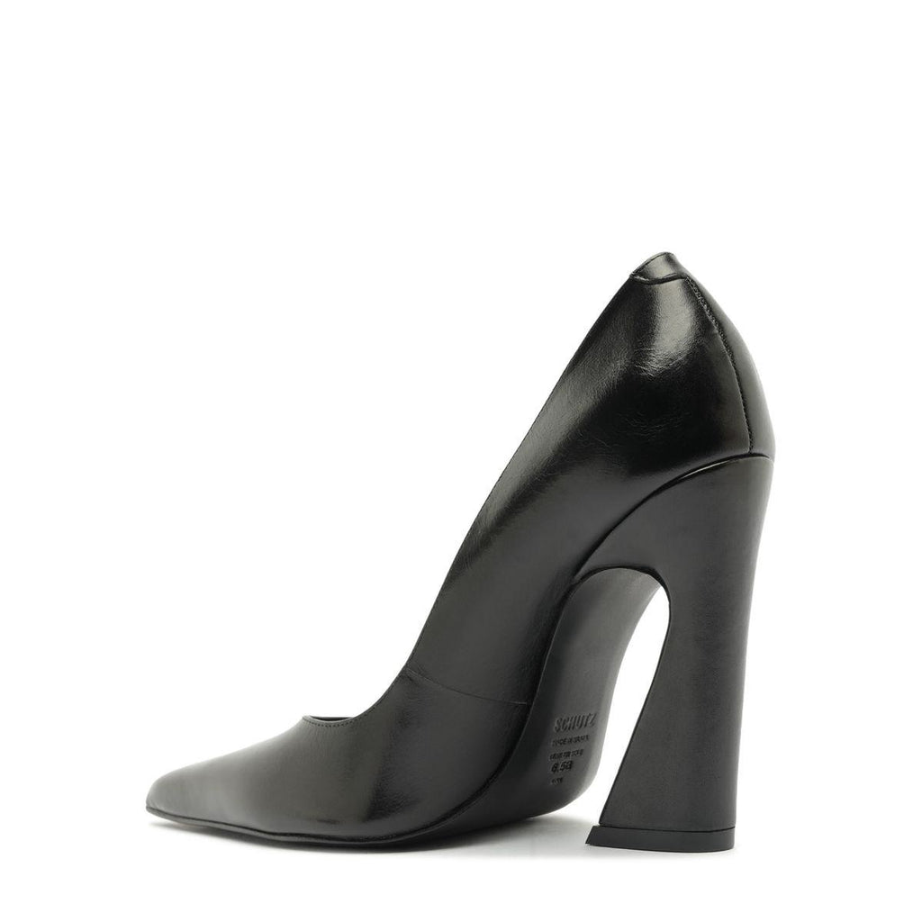 Side view of Lexi Block Pump in Black showcasing its pointed toe and sculptural platform heel with a white background