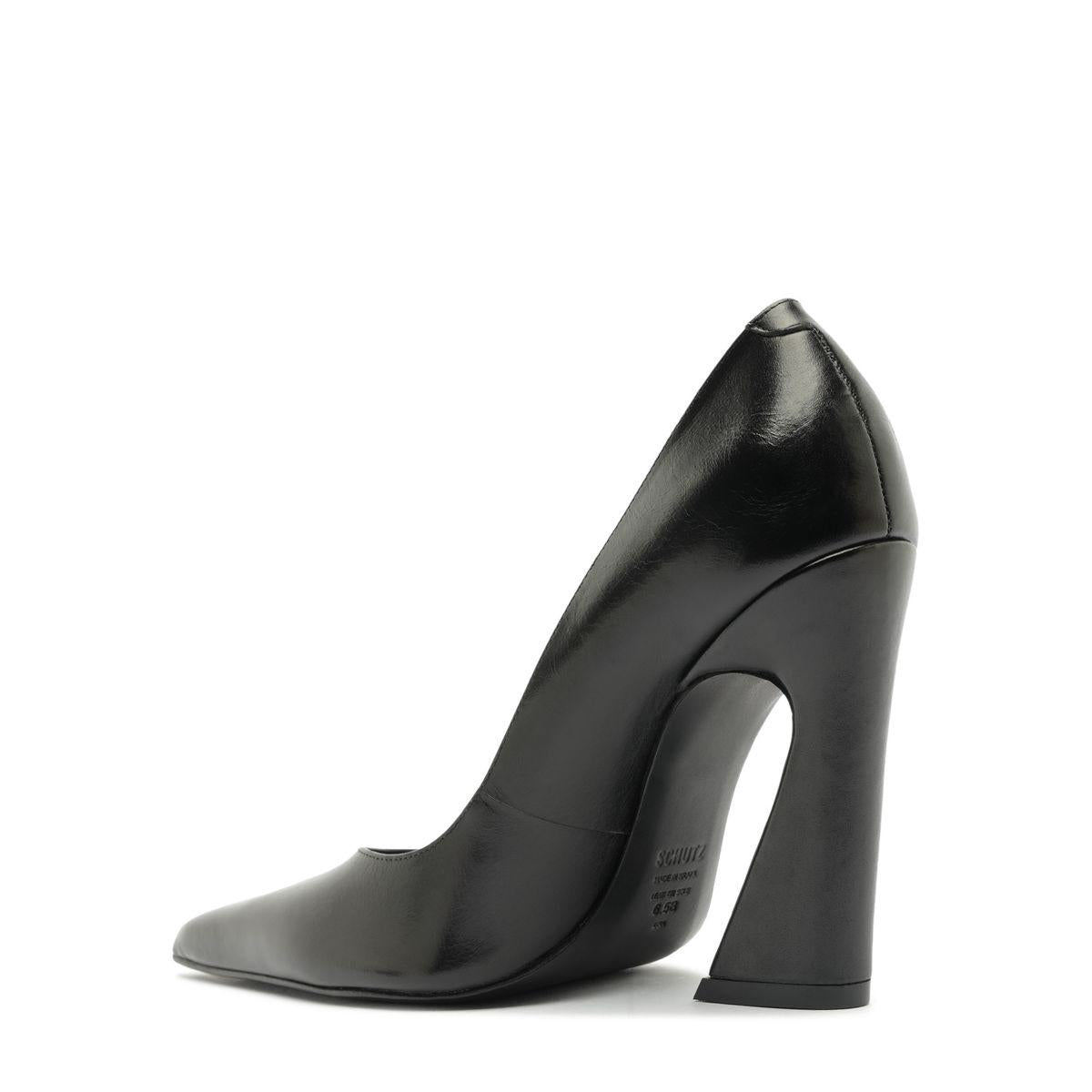 Side view of Lexi Block Pump in Black showcasing its pointed toe and sculptural platform heel with a white background