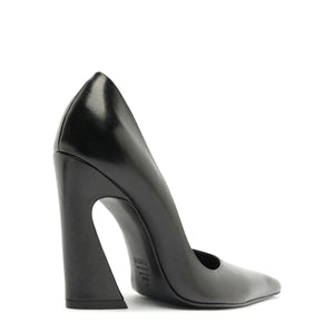 Side view of Lexi Block Pump in Black showcasing its pointed toe and platform heel against a white background