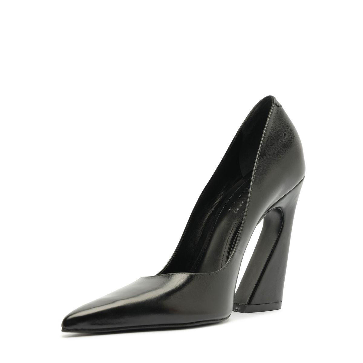 Side view of Schutz Lexi Block Pump in Black showcasing pointed toe and sculptural platform heel on white background