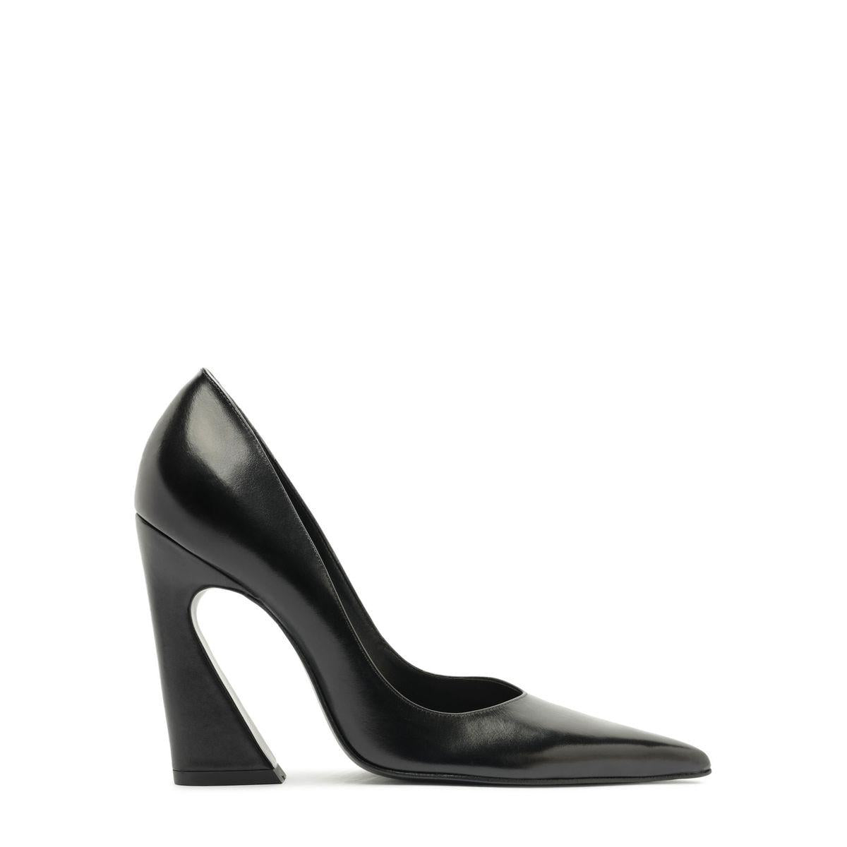 Side view of Lexi Block Pump in Black showcasing pointed toe and sculptural platform heel with white background