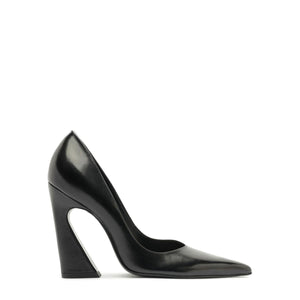 Side view of Lexi Block Pump in Black showcasing pointed toe and sculptural platform heel with white background