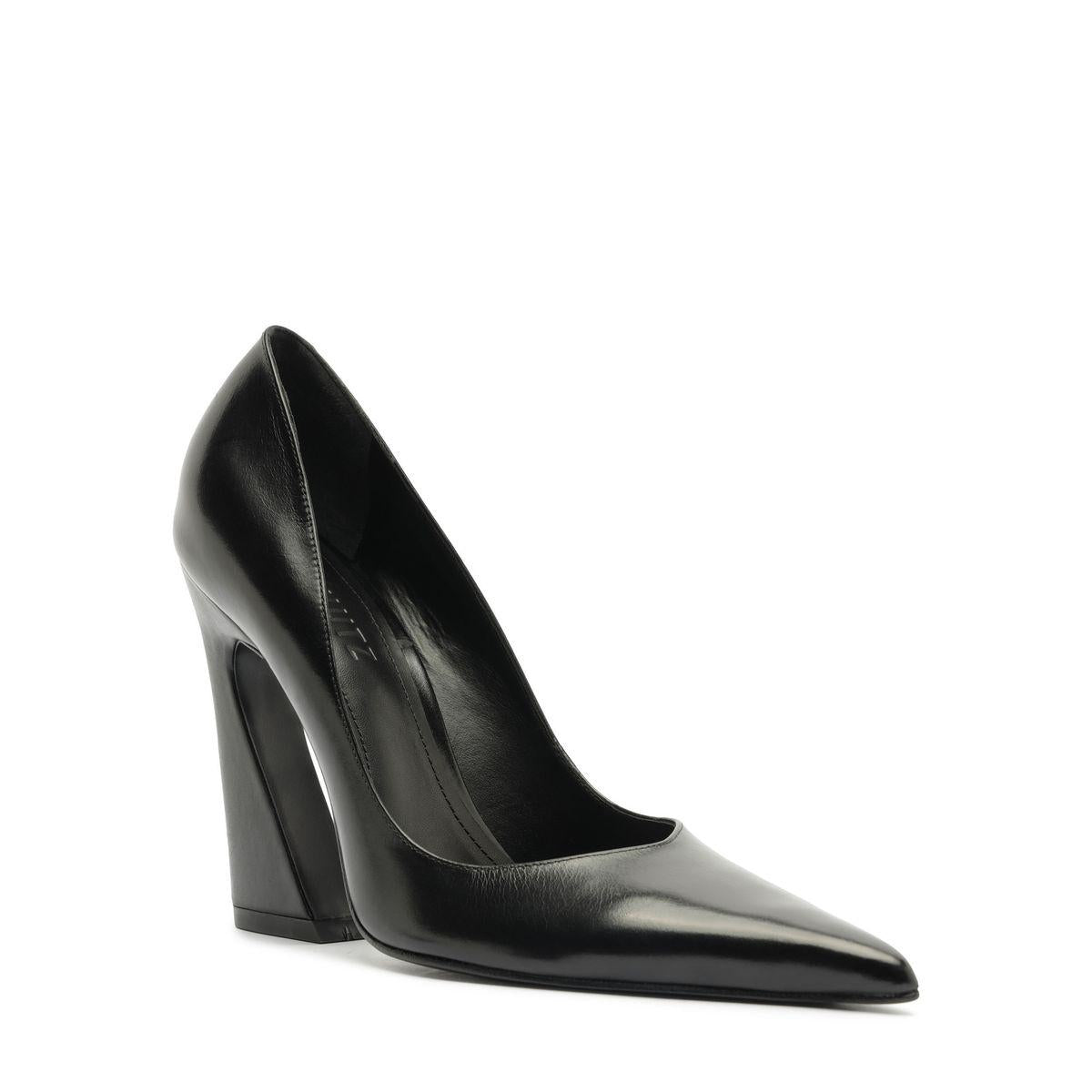Side view of Lexi Block Pump in black showcasing its pointed toe and sculptural platform heel on a white background