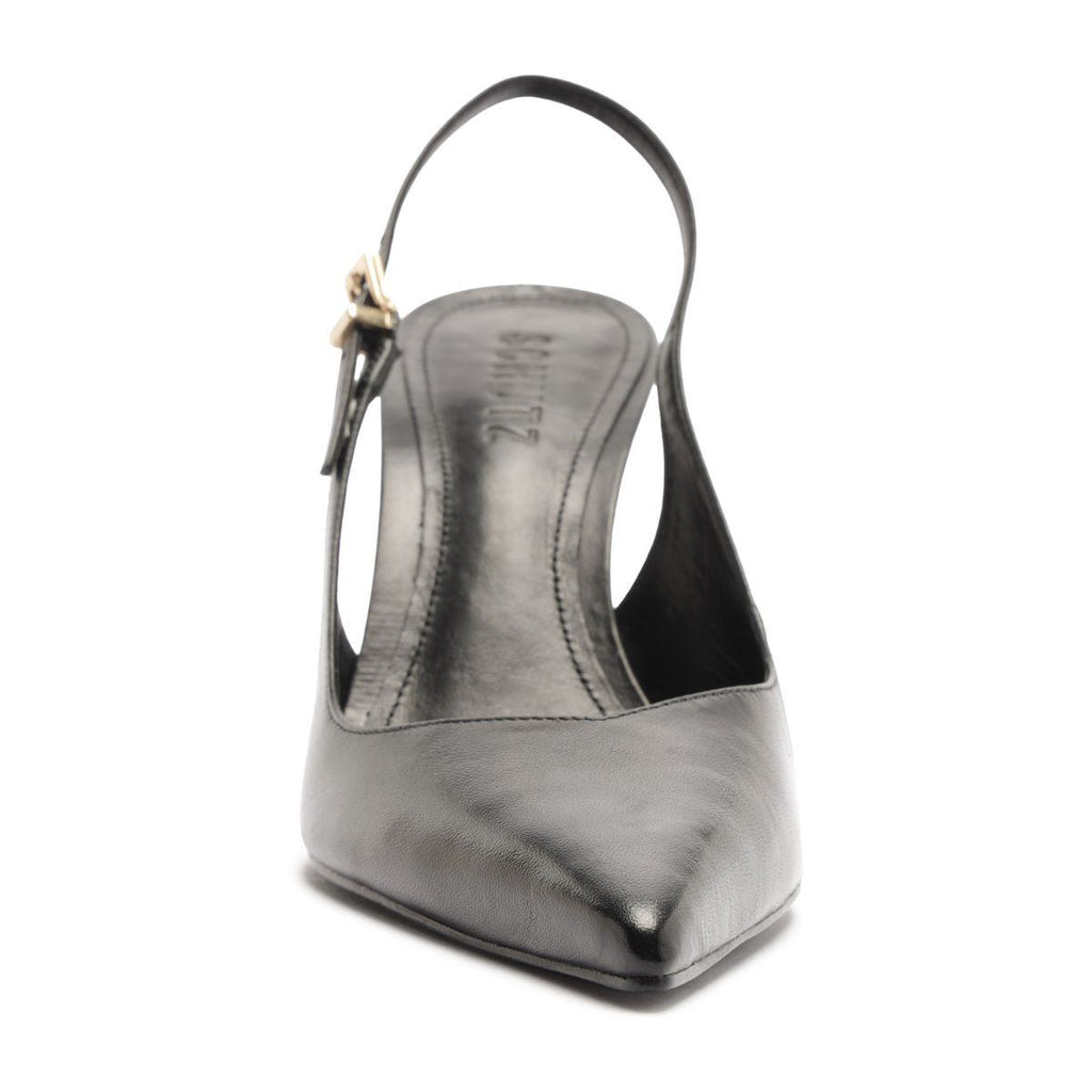 Rear view of Lexi Sling Block Leather Pump in Black showing slingback strap, open counter, and block heel on white background