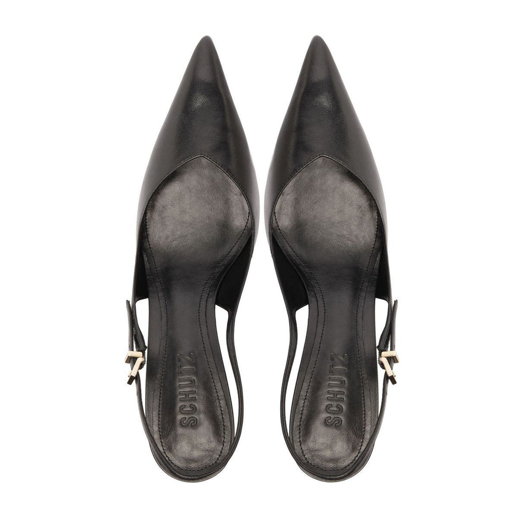 Top view of Lexi Sling Block Leather Pump showcasing pointed toes, open counters, and buckle closures on a white background