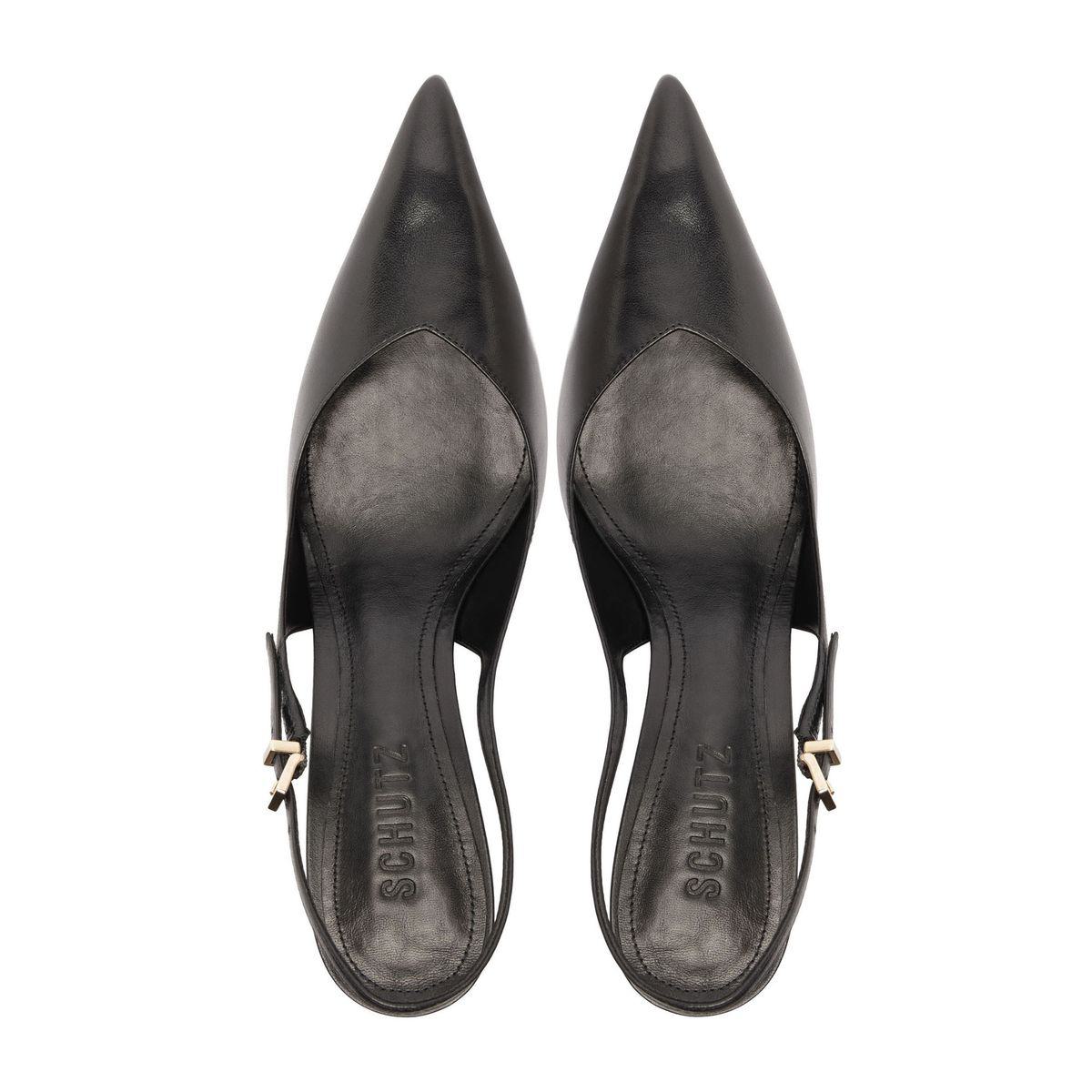 Top view of Lexi Sling Block Leather Pump showcasing pointed toes, open counters, and buckle closures on a white background