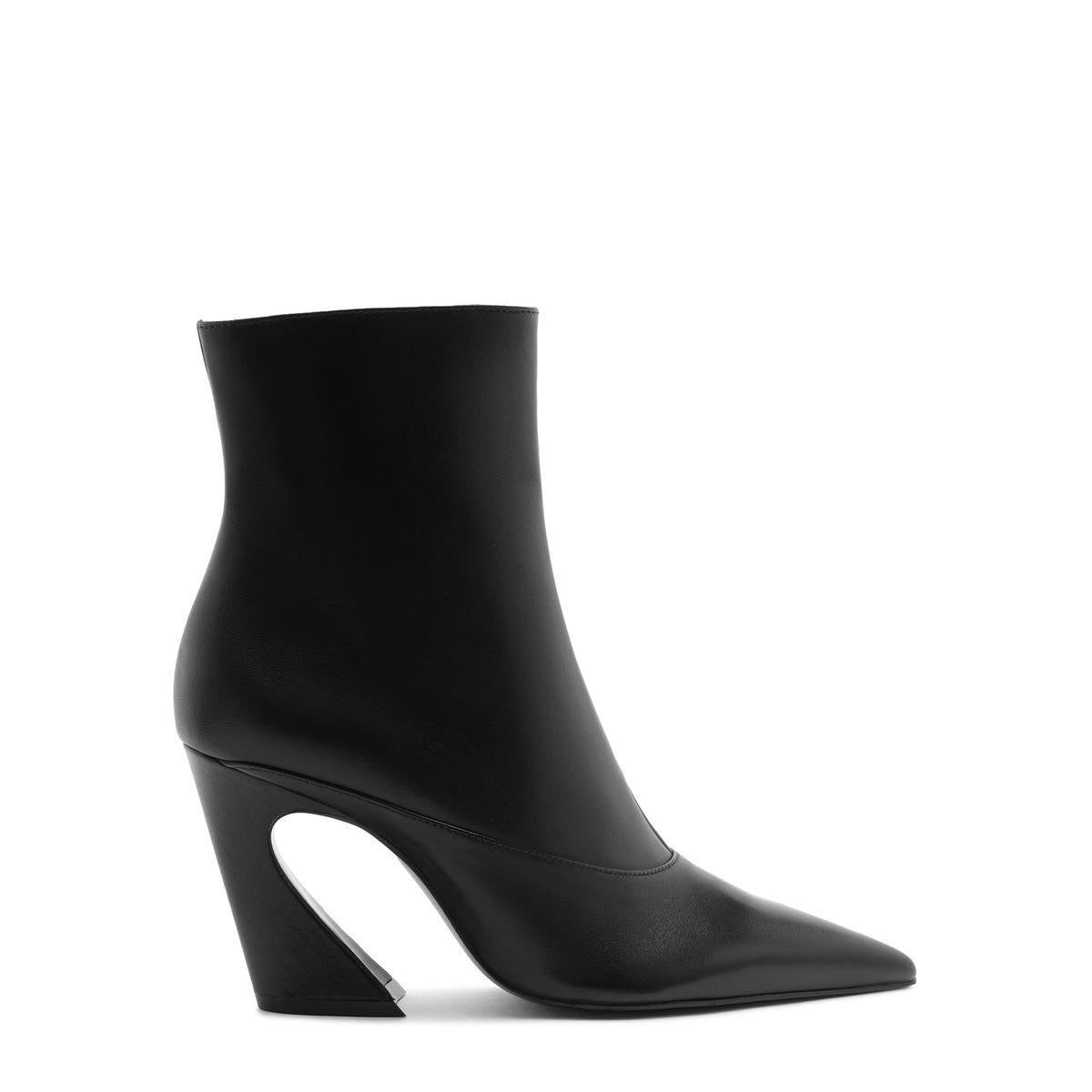 Side view of Lexi Mid Leather Bootie in Black showcasing its pointed toe and block heel on a white background