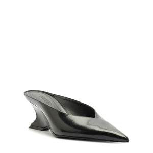 Side view of Siena mid mule pump in black showcasing its pointed toe and sculptural heel on a white background