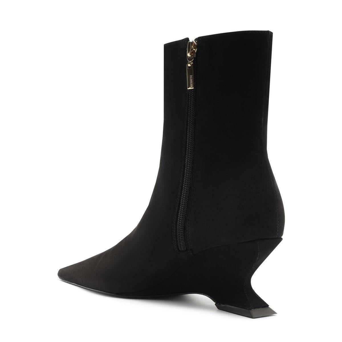 Side view of black Siena mid bootie showcasing pointed toe, zip closure, and wedge heel with white background