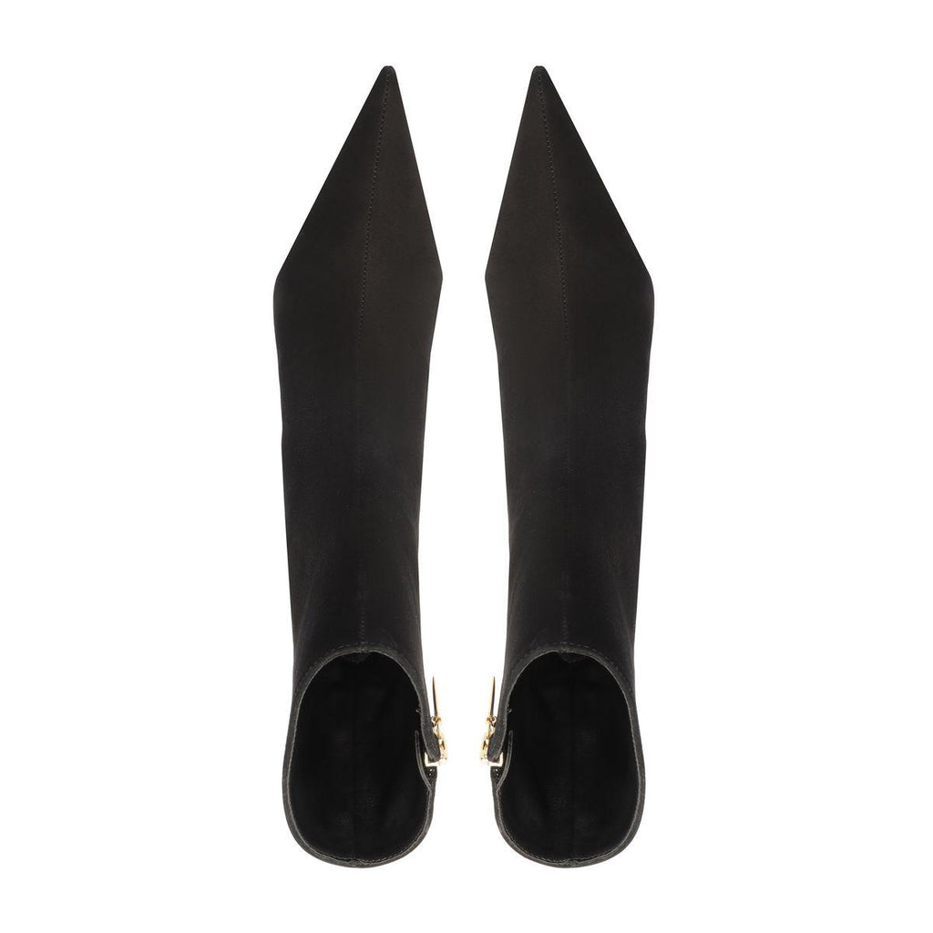 Top view of the Siena Mid Bootie in Black showcasing pointed toes and zip closures on a white background