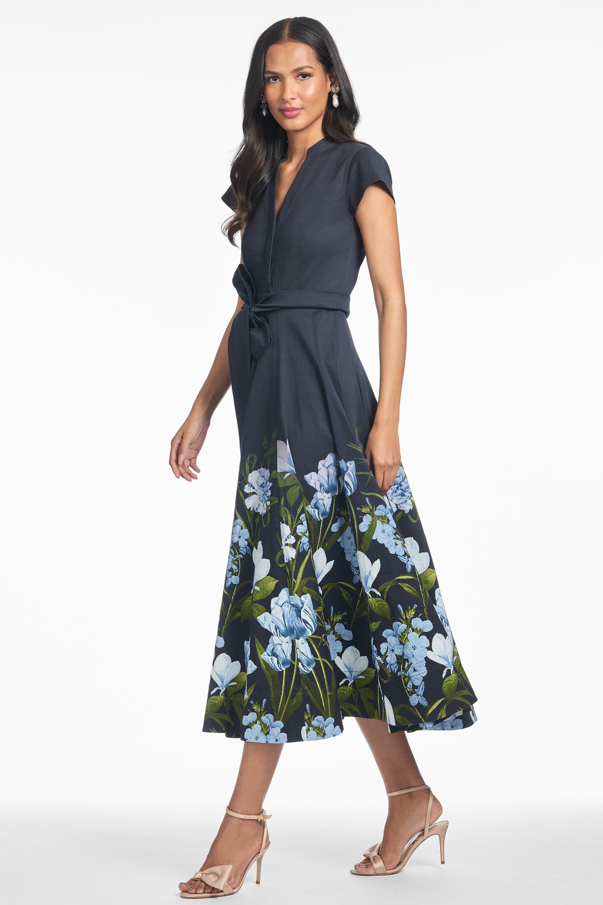 Ganika Dress in Night Sky Prima Garden, three-quarter view showing A-line fit, banded collar, self-tie waist and floral skirt