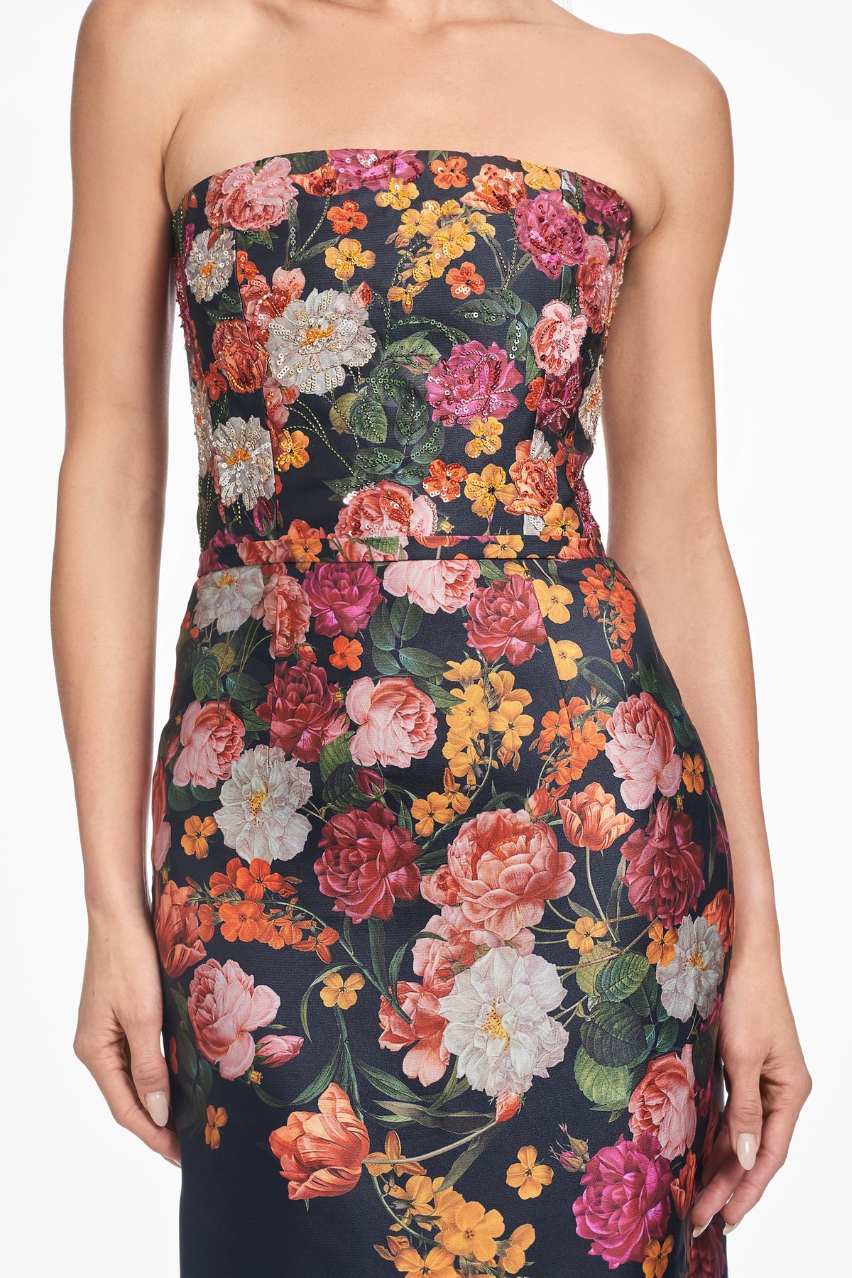 Front close-up of Embellished Sabine Gown Midnights Magic Blooms showcasing embellished floral print and attached belt with white background