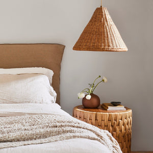 kasbah rattan tall pendant in bedroom