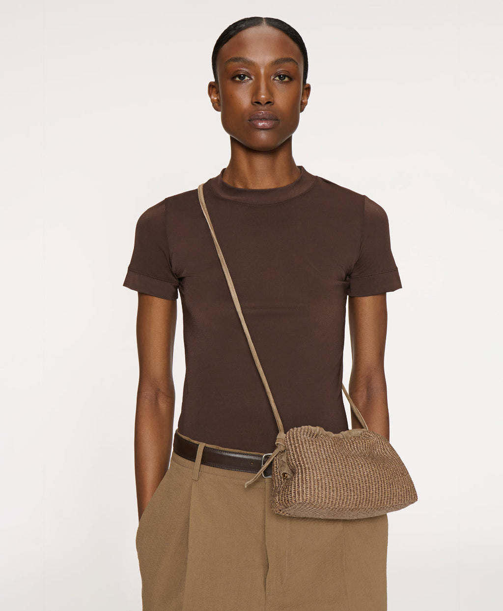 Mini Cloud Clutch - Anise Raffia/Anise Suede on model 
