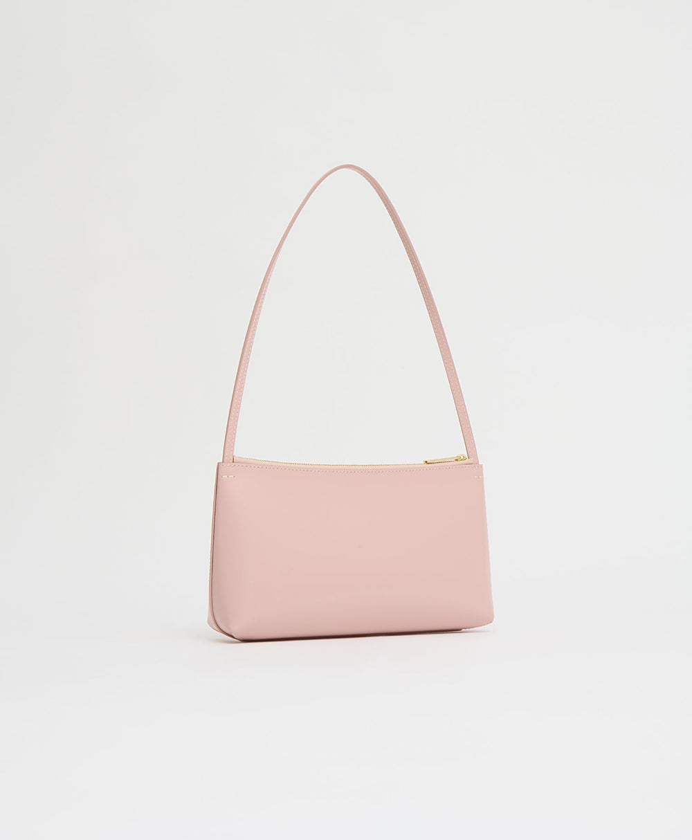 Front view of Gaia Shoulder Bag in Zucchero/Anise showing slim shoulder strap and top zip closure on light background