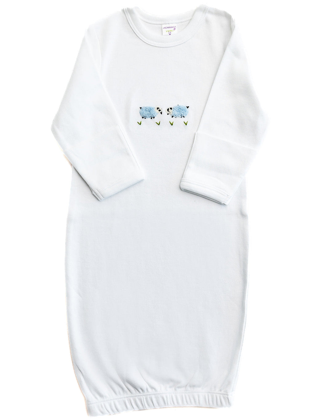 White baby gown with floral embroidery on a white background