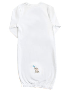 White baby onesie with a small embroidered design on a white background