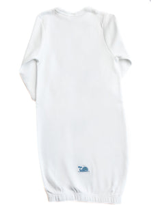 White baby onesie with a small blue logo on a white background