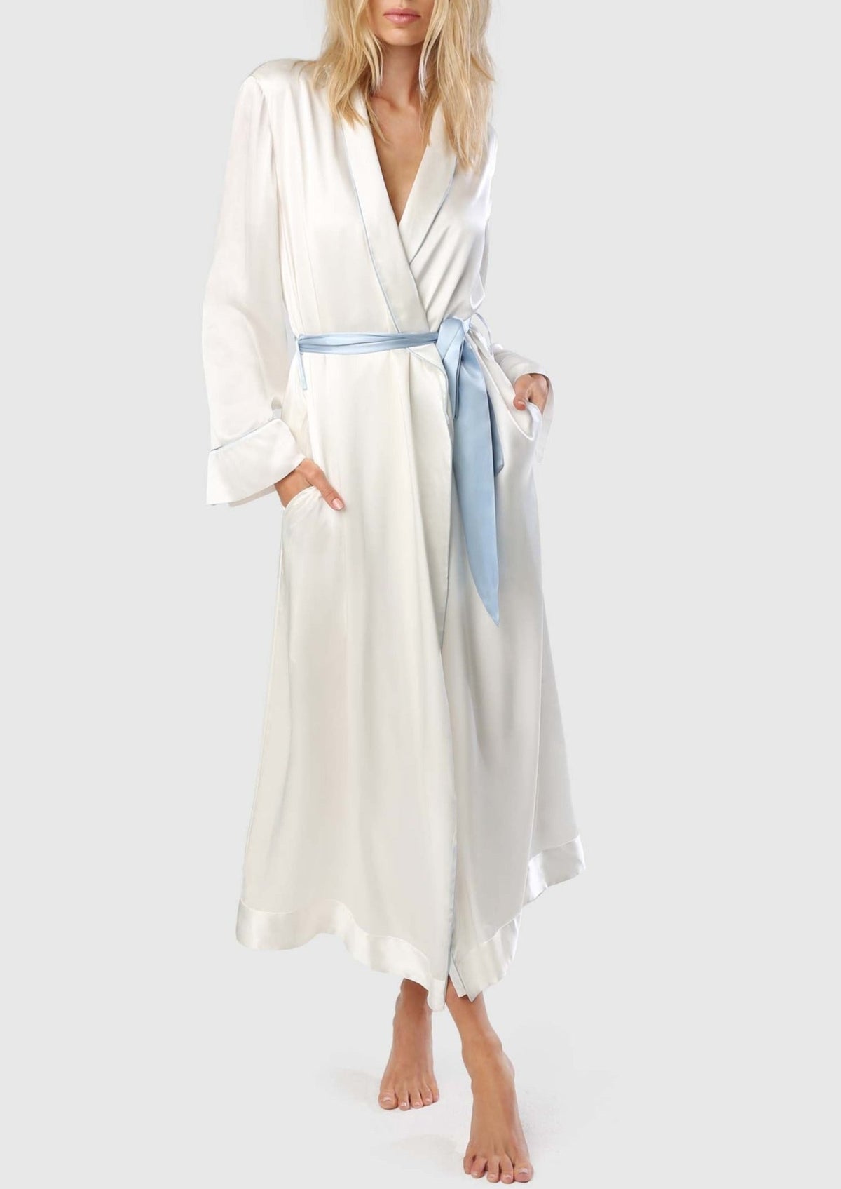 Front view of Kiki Silk Lounge Robe in Ivory/Blue showcasing its long silhouette and blue sash on a light gray background