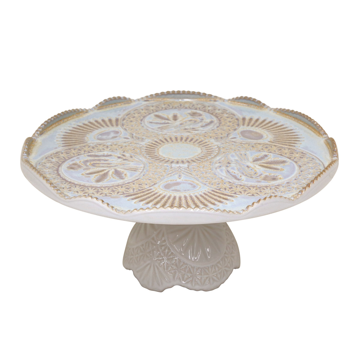 Front view of Costa Nova Cristal footed plate in Nacar showing ornate crystal-inspired pattern on white background