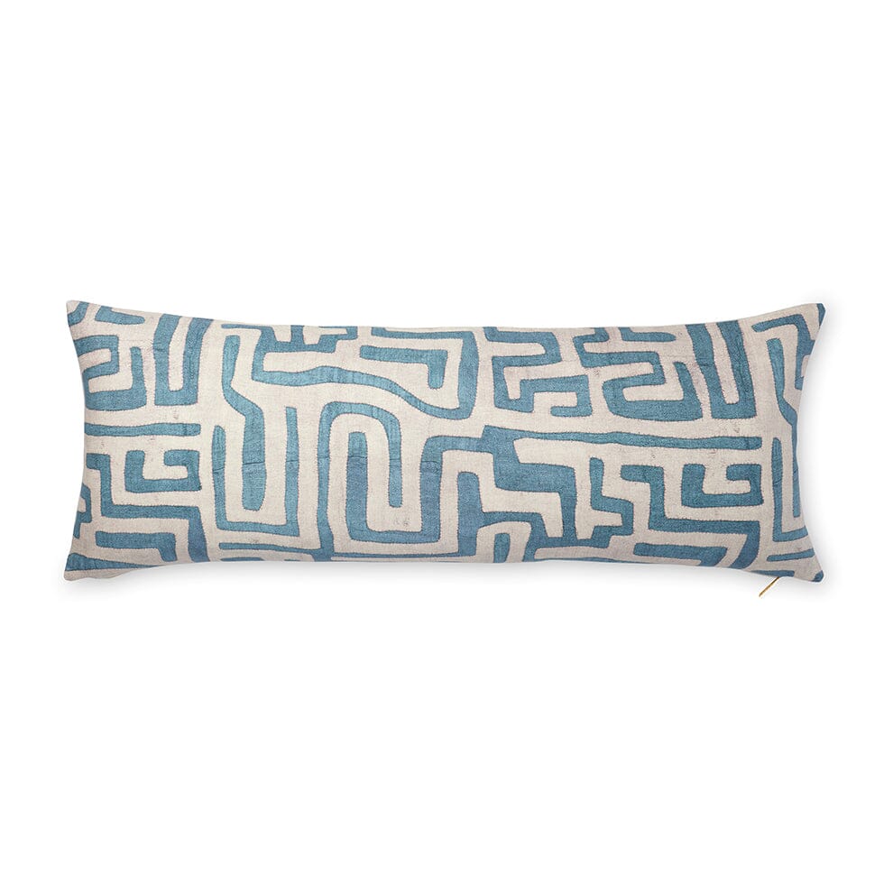 Overhead view of indigo Kuba-cloth 40 x 15 in lumbar pillow with blue geometric embroidery on white background