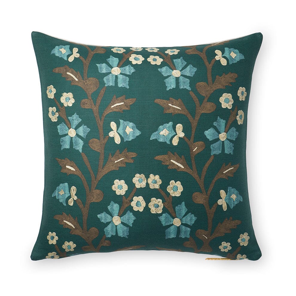 Front view of Spruce Tree of Life Suzani Pillow with embroidered tree of life floral design on white background
