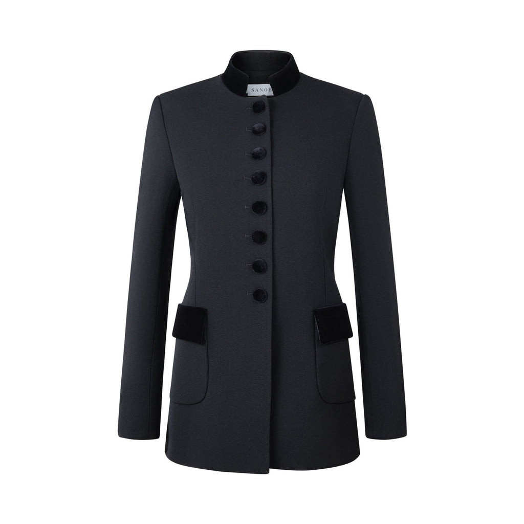 Front view of the black Safi Nero blazer showcasing velvet-covered buttons and flap pockets on a white background