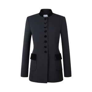 Front view of the black Safi Nero blazer showcasing velvet-covered buttons and flap pockets on a white background