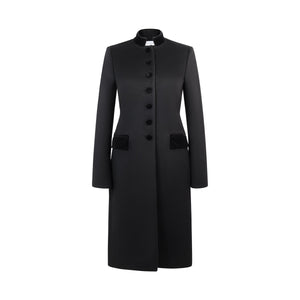 Front view of Safi Coat in Black showcasing its tailored silhouette, velvet collar and pockets against a white background