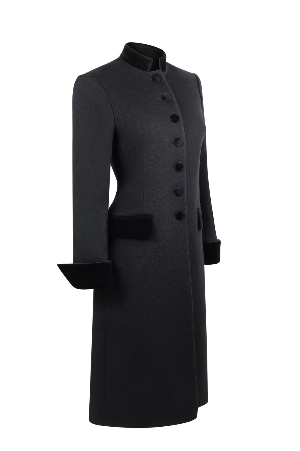 Three-quarter view of Safi Coat in Black showcasing tailored fit, velvet collar and pocket detailing with a white background