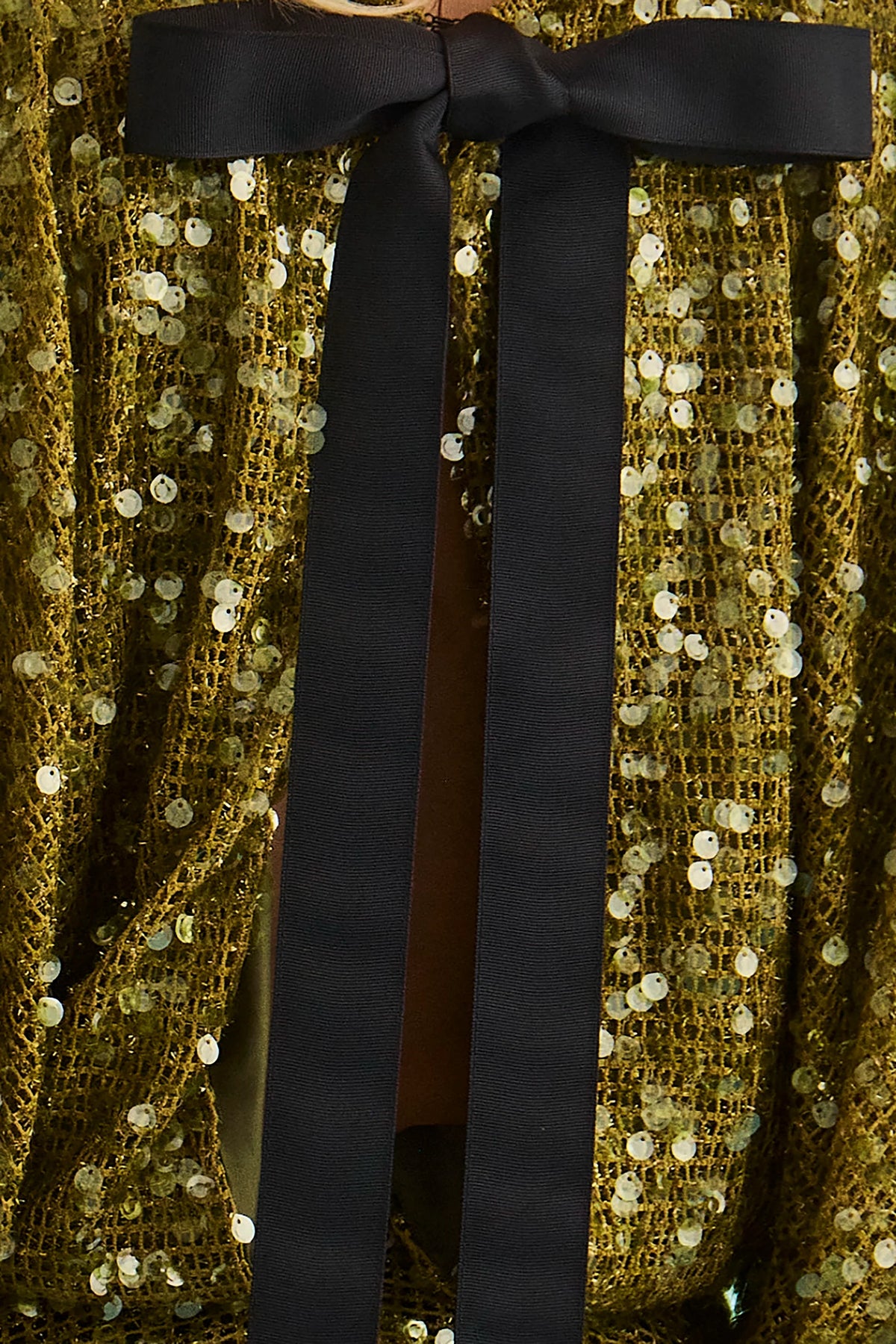 Close up of the Salter Mini Dress in Moss Sequin. 