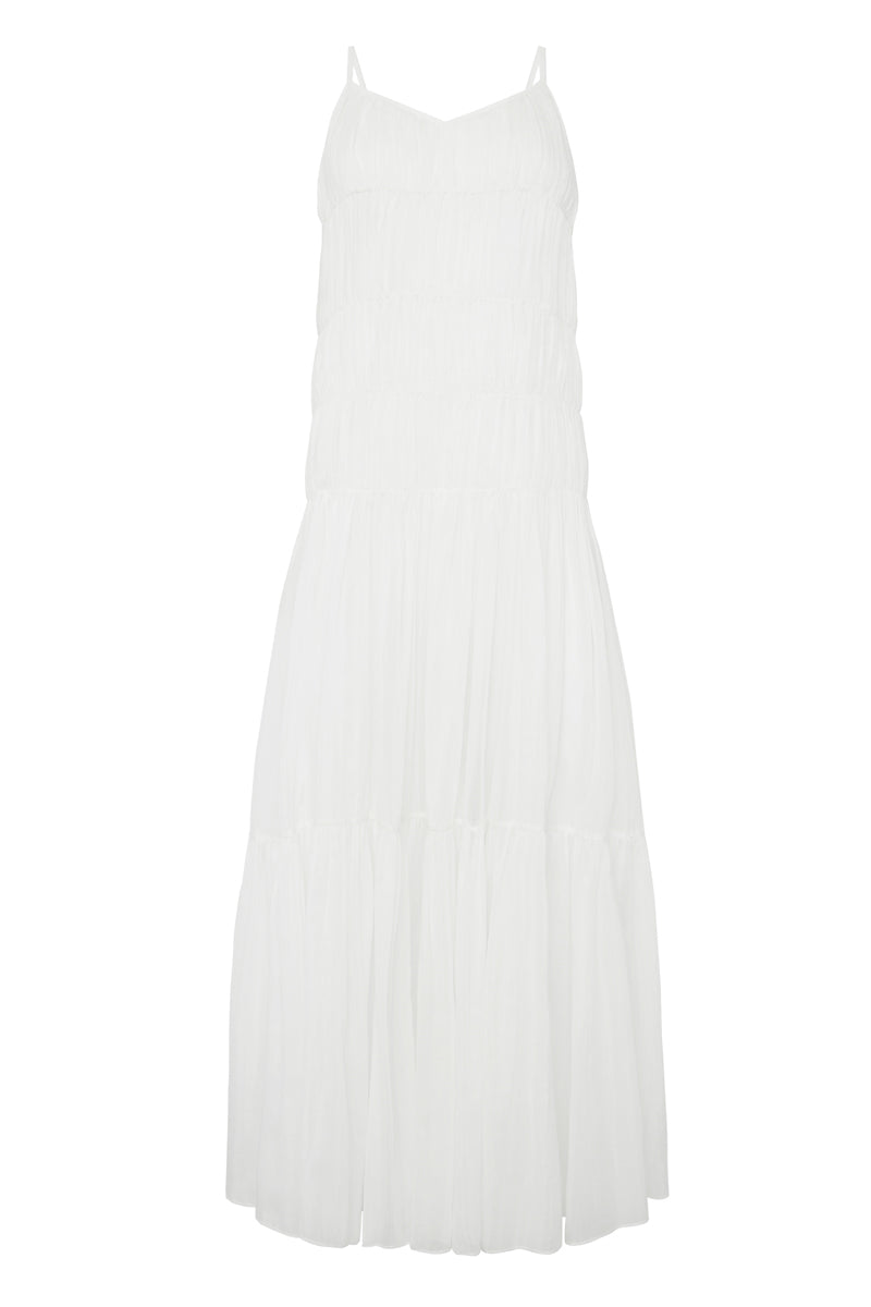 Front view of the Sanibel Dress in Ivory showcasing its thin straps and flowing maxi silhouette against a white background