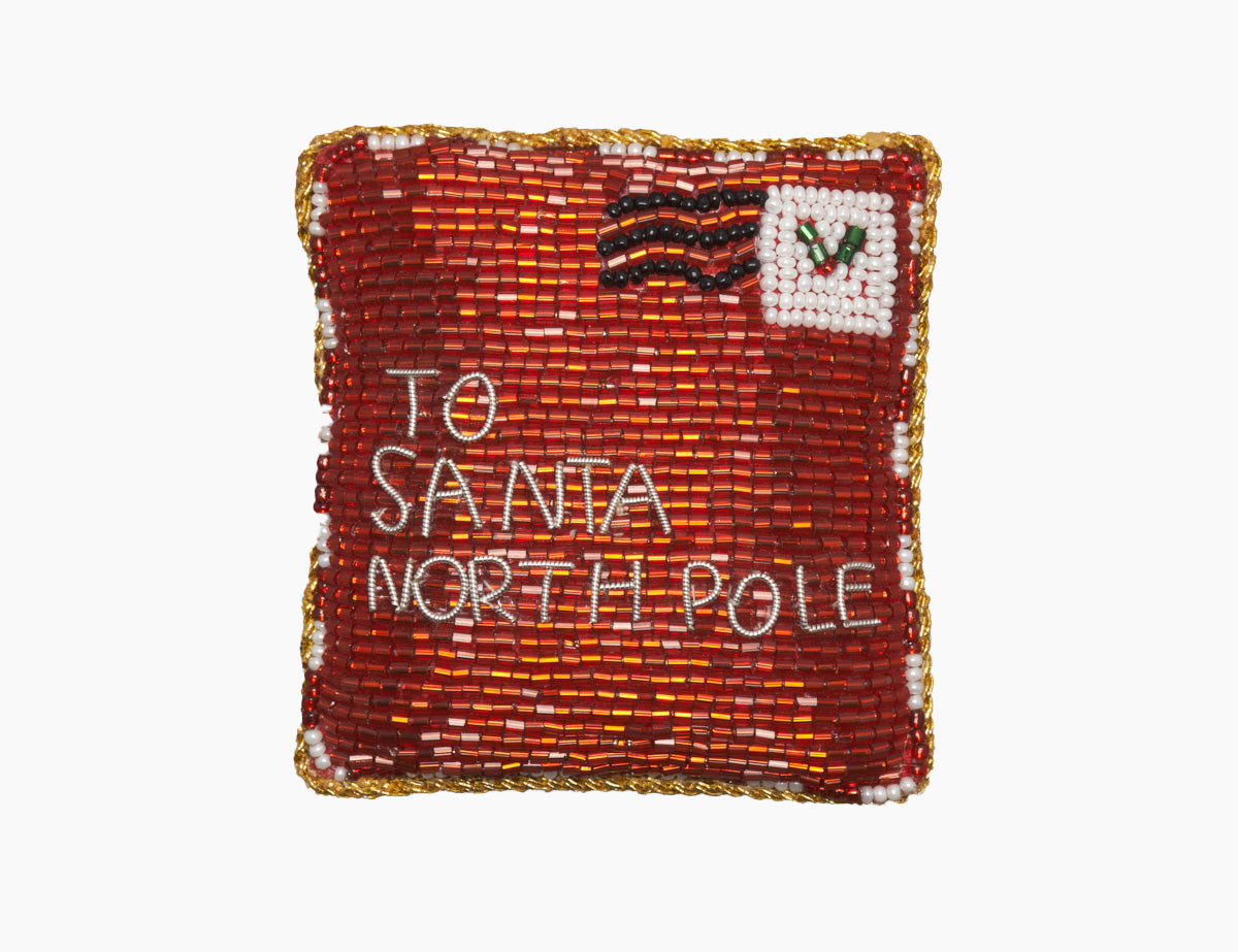 Front view of Santa Letter Ornament showcasing beadwork and metallic thread spelling To Santa North Pole on red velveteen fabric