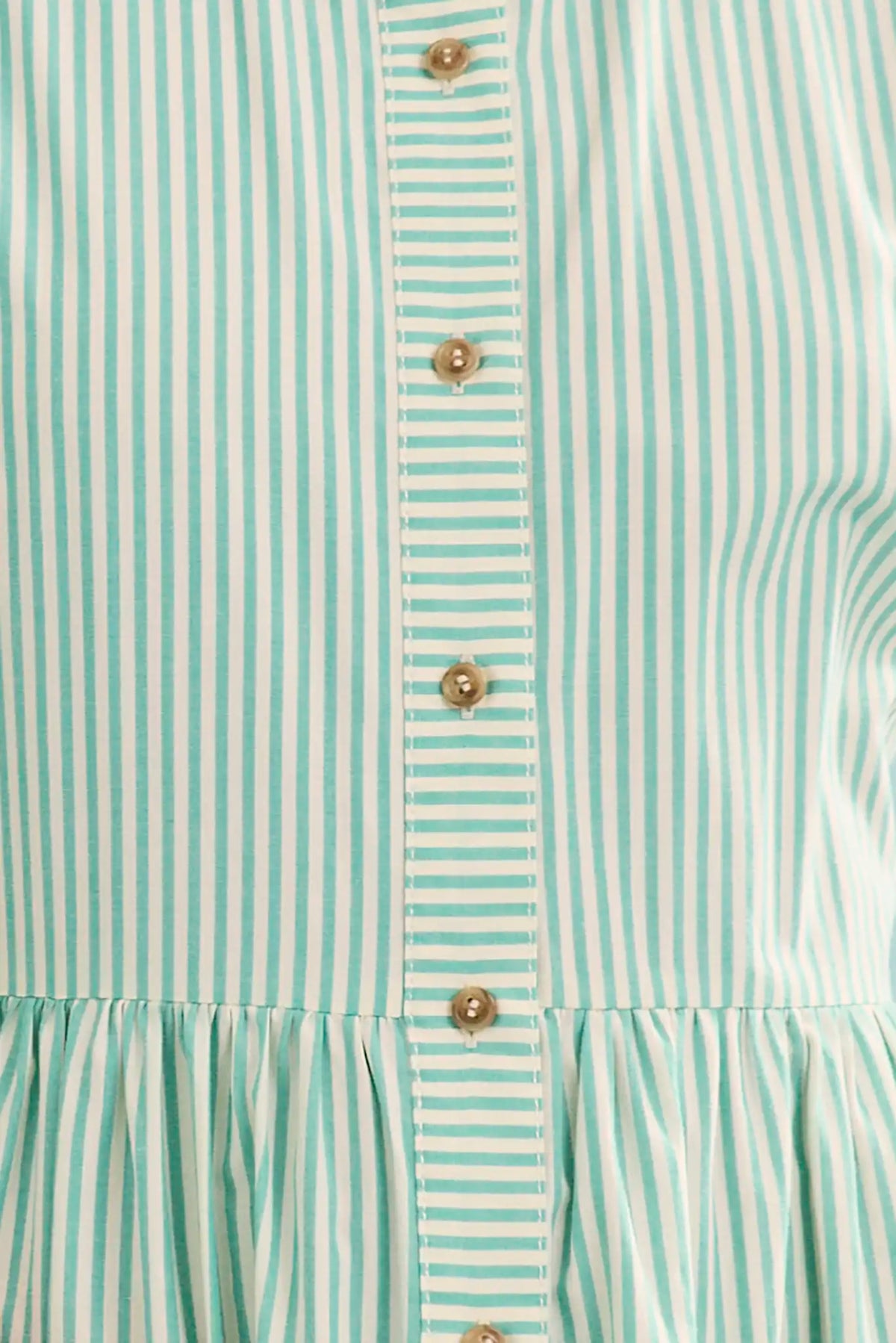 Close up of The Sarah Dress in Saltwater. 