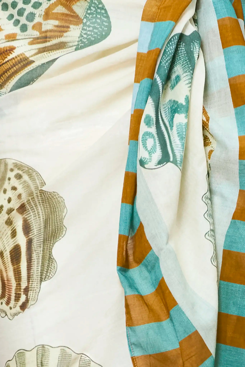 Close up of the sarong in Somers Shell Cream.