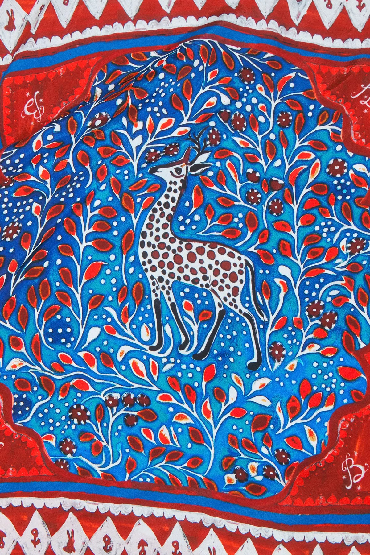 Double-sided printed scarf showcasing a whimsical winter tableau with a charming fawn at the center.