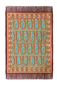 The scarf in Amber Glen Brown. 