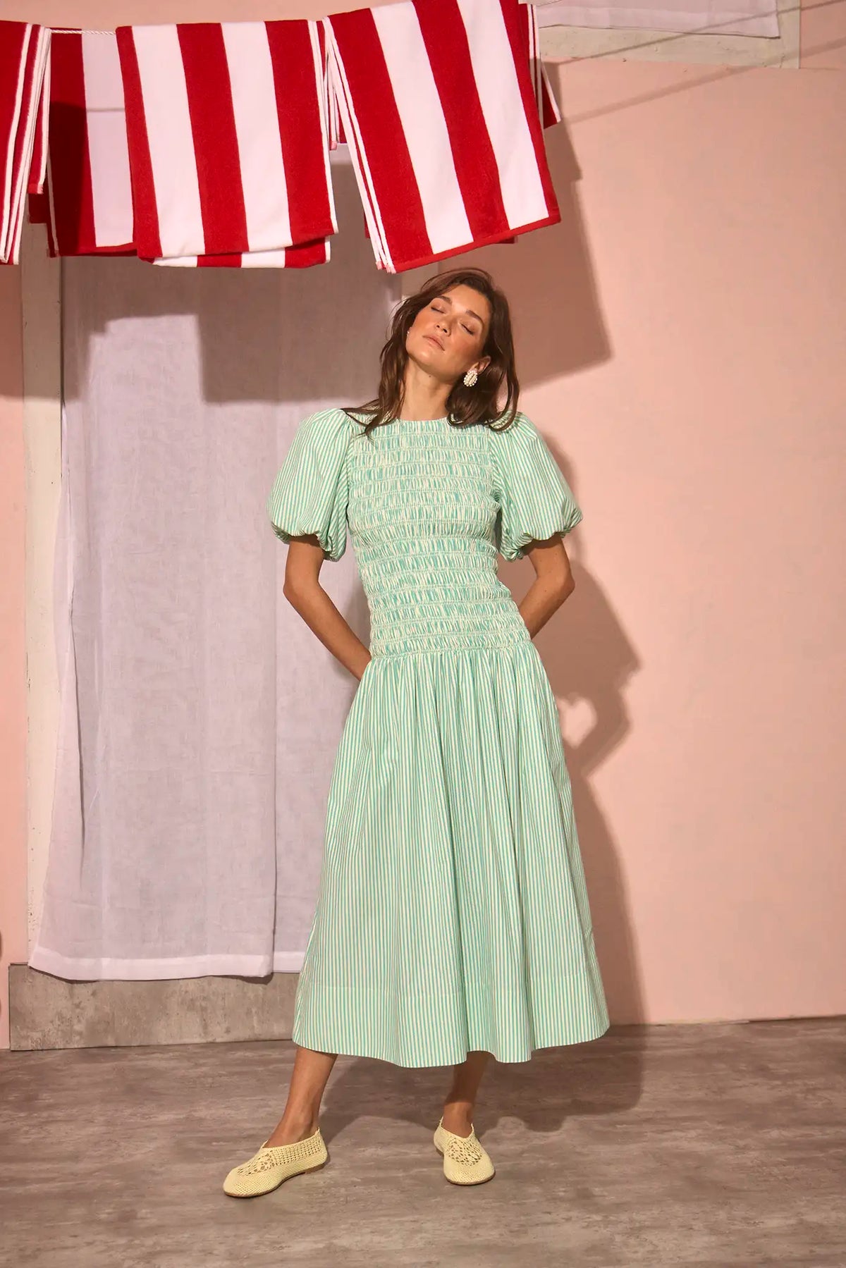 The Scarlet Dress in Saltwater paired with pale yellow shoes.