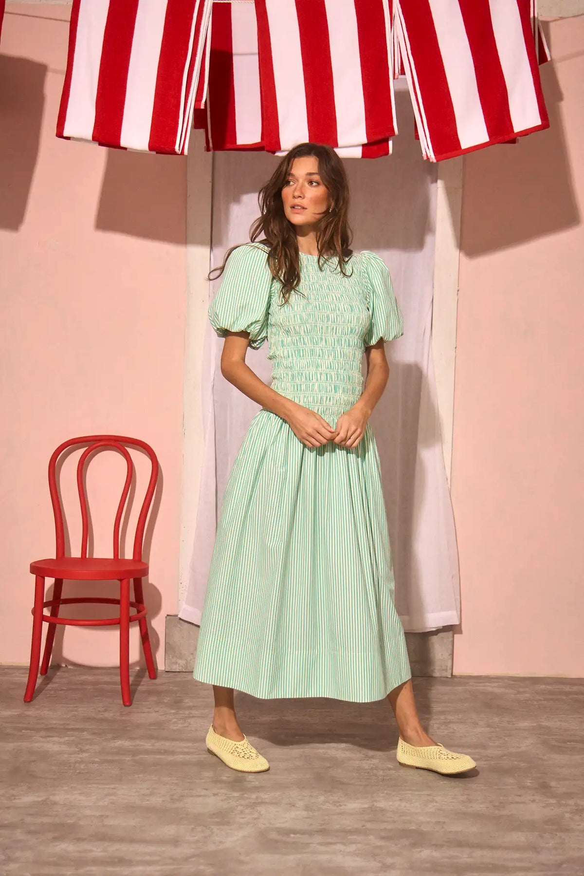 The Scarlet Dress in Saltwater paired with pale yellow shoes.