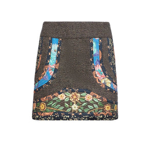Front view of Schulte Skirt in High Country Tweed showcasing contrast seaming and print mixing with a white background