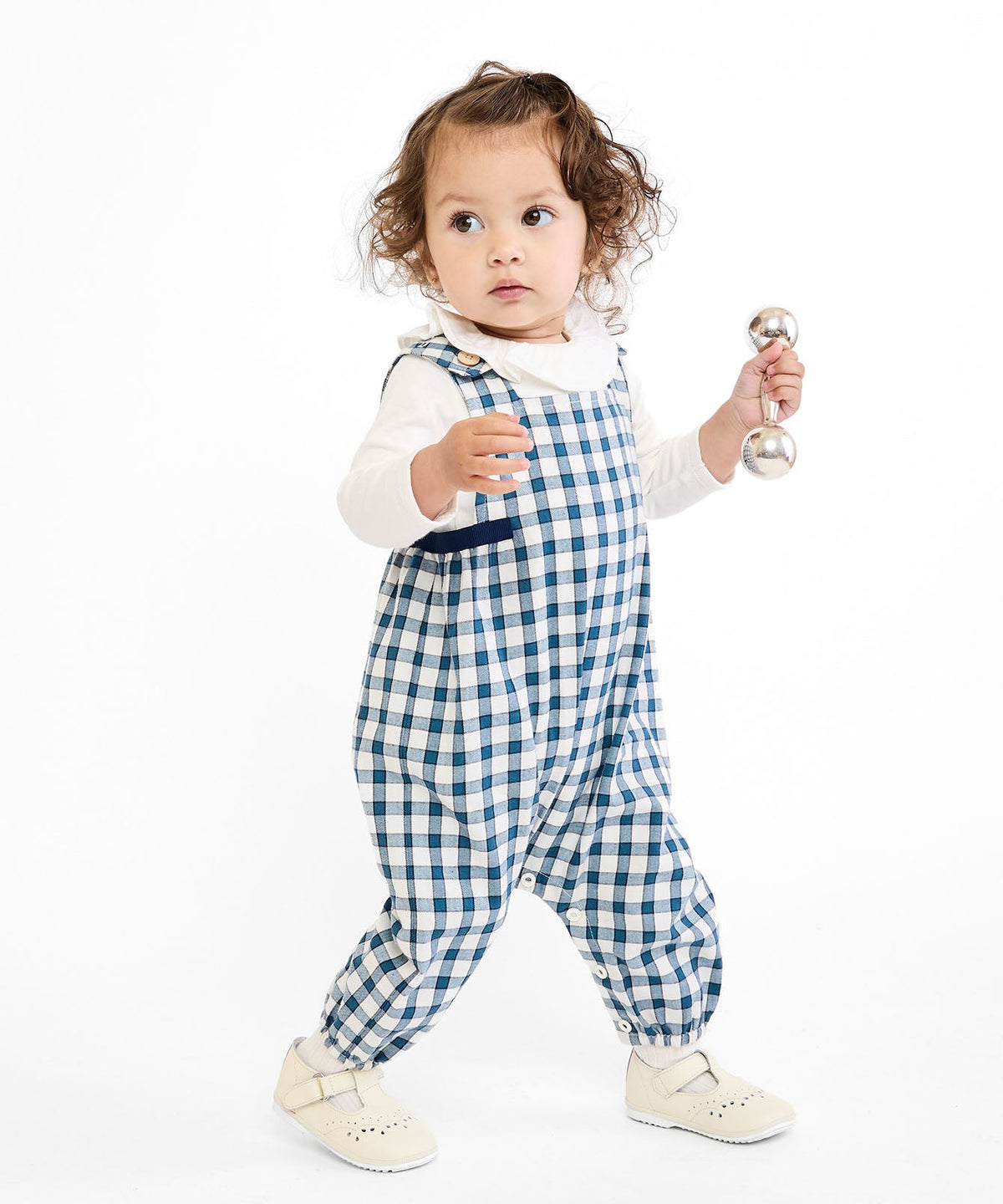 Front view of Scout Baby Overall in Blue Picnic Check showcasing blue gingham check, shoulder buttons, and snap closures against a white background