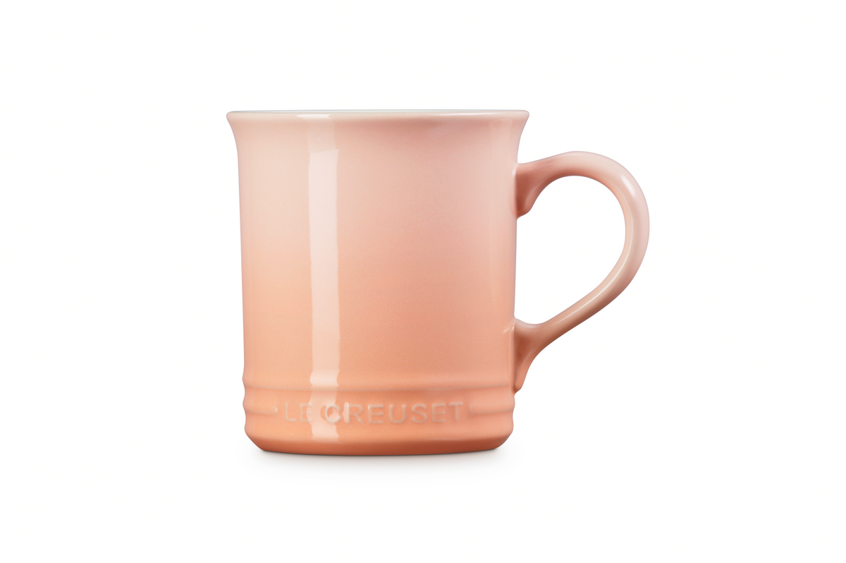 Front view of Mug in Peche showcasing its three-ring accent and curved handle with a white background