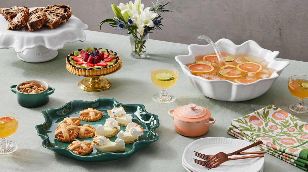 Front view of Mini Round Cocotte in Peche showcasing its round lidded design on a dessert table