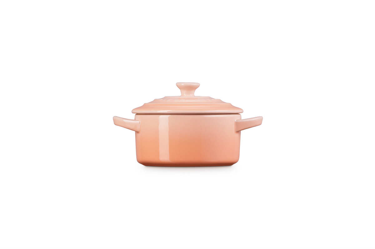Front view of Mini Round Cocotte in Peche showcasing its lidded stoneware design with a white background