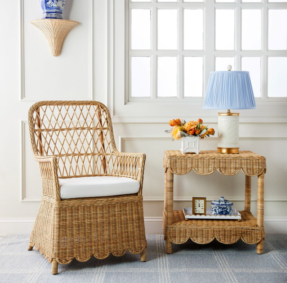Three-quarter view of Coco children’s chair showcasing woven rattan frame and white seat cushion with a light-styled room background
