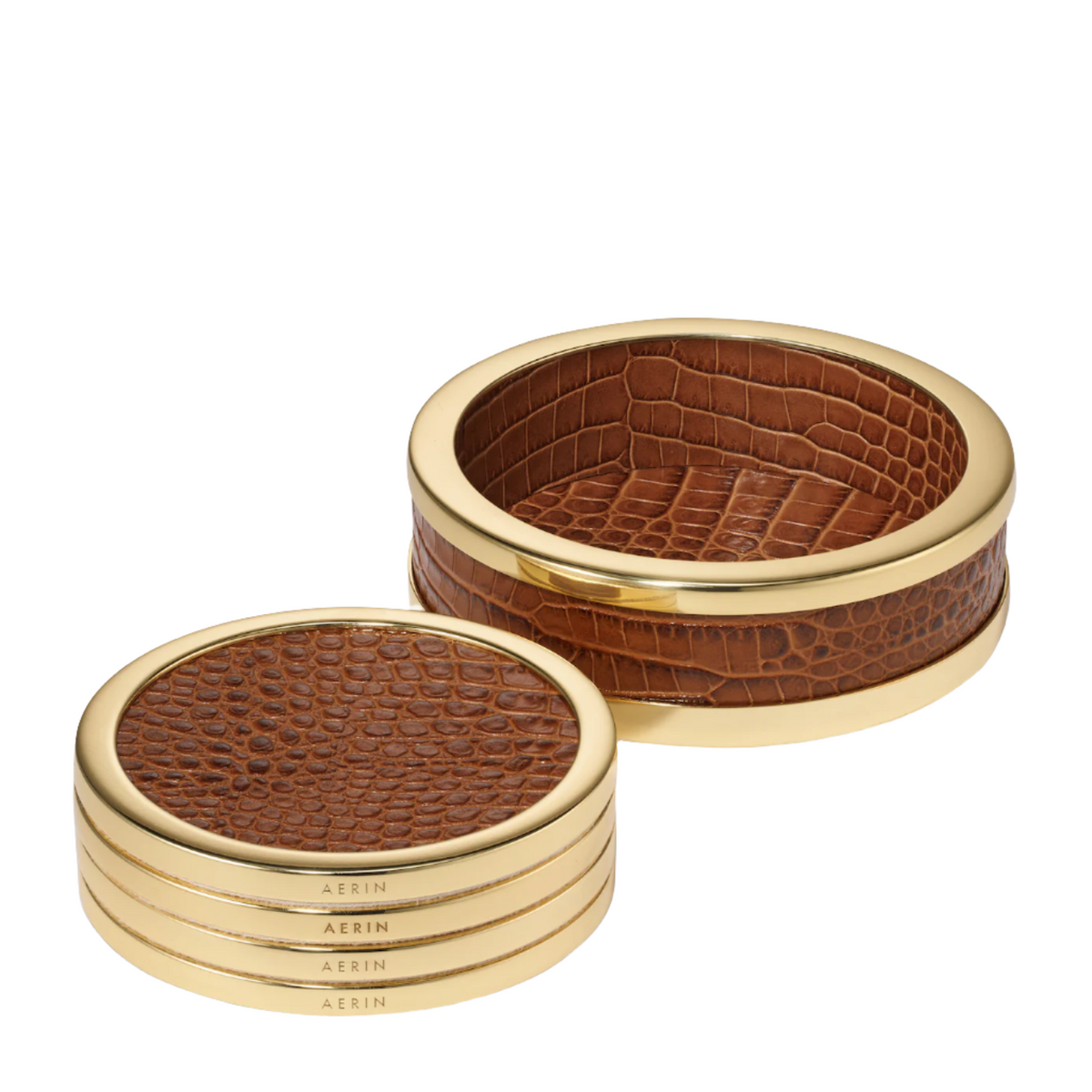 Angled view of Classic Croc Leather Coasters in Chestnut, Set of 4 showcasing croc embossing and gold-toned brass on white