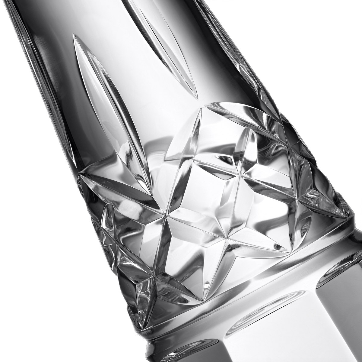 Close-up of Lismore Round candlestick showcasing Lismore cut-star crystal pattern on white background