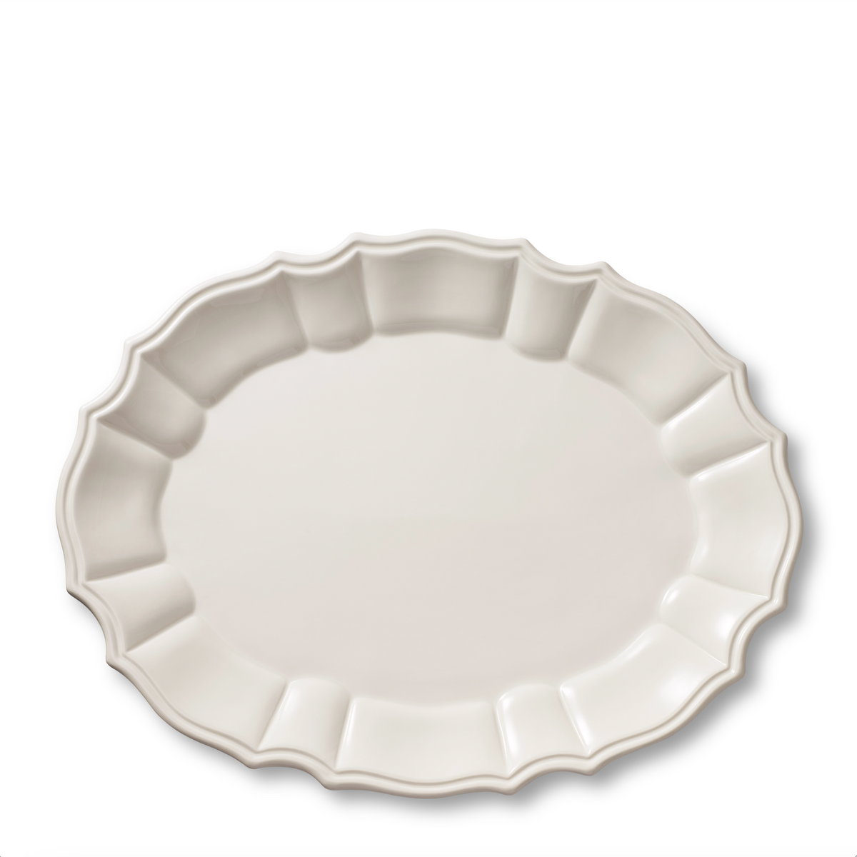Top view of Arno Oval Platter in Cream showcasing its rosette-style trim on a white background