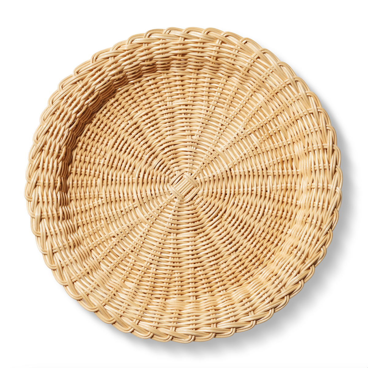 Top view of Freya Charger showcasing hand-woven wicker and looped edging with a white background